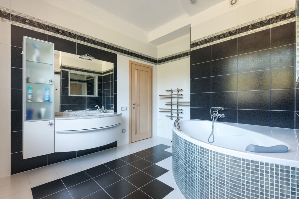 The Art of Drawing Readers In: Your attractive post title goes here Sleek and modern bathroom interior with elegant black and white tiles.